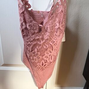 Pink Lace Bodysuit from Free People
